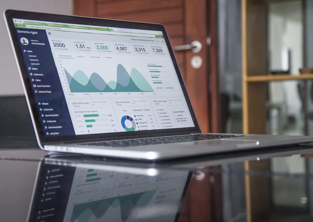 A laptop displaying a workforce analytics dashboard